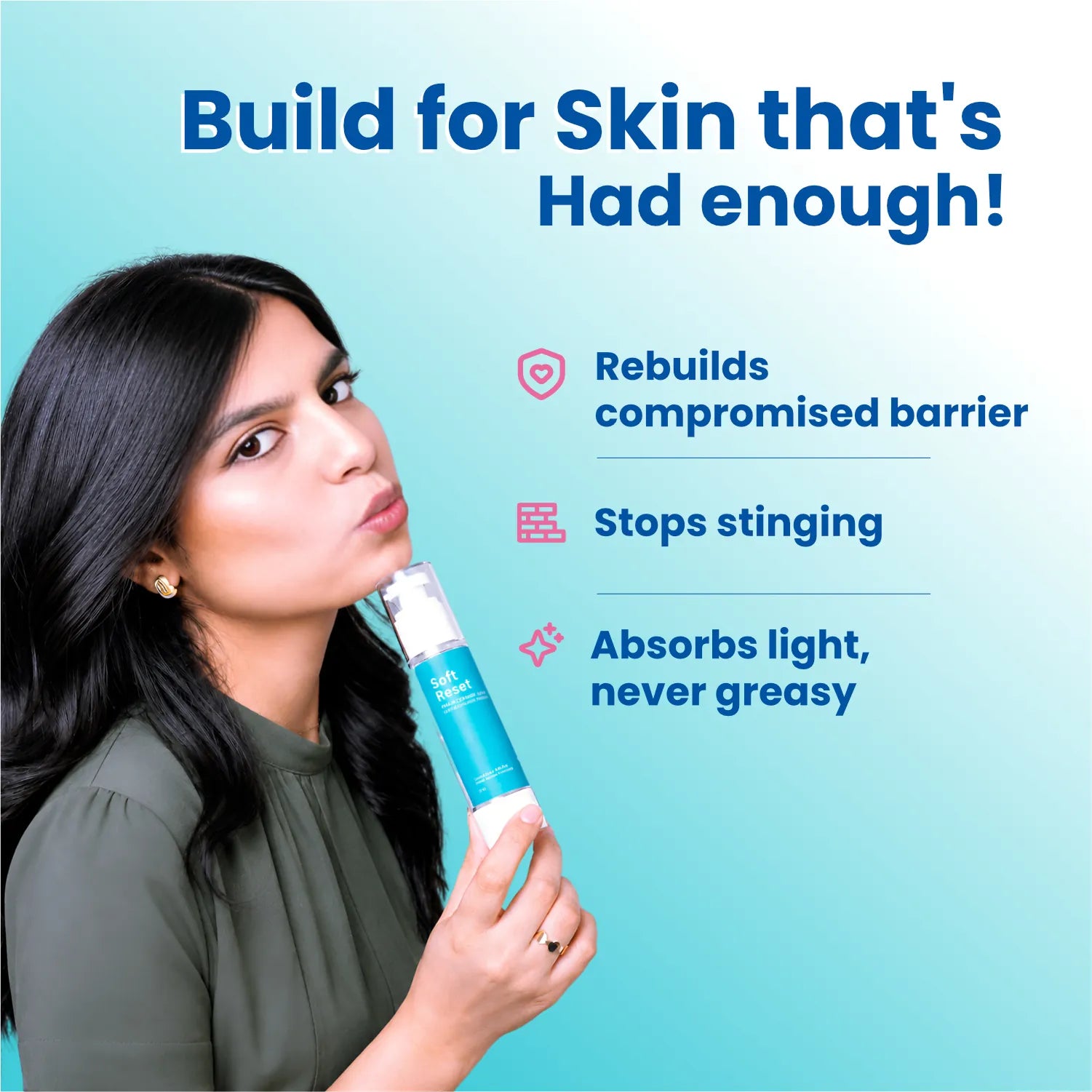 Woman holding Soft Reset moisturiser — rebuilds a compromised barrier, stops stinging, and absorbs light without feeling greasy